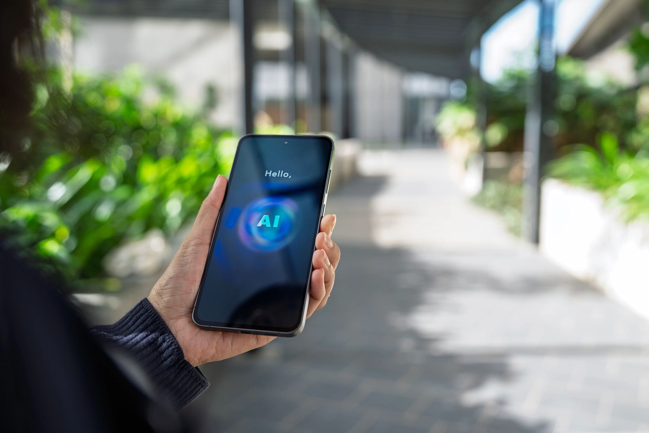 Person holding a smartphone, representing secure digital communication